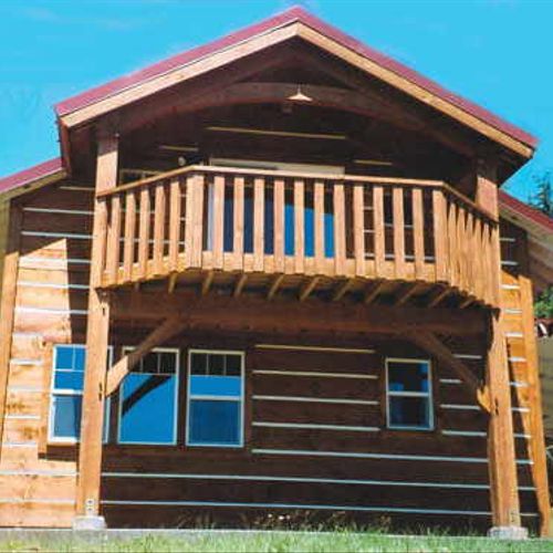 Half-log siding makes a log cabin affordable!