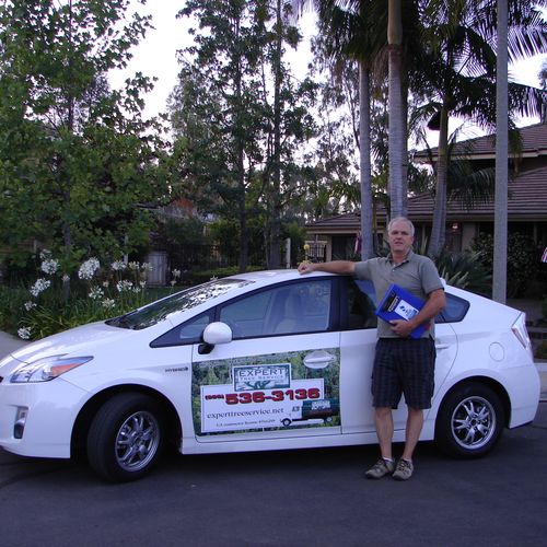 Dean saving fuel and costs by driving a hybrid Pri