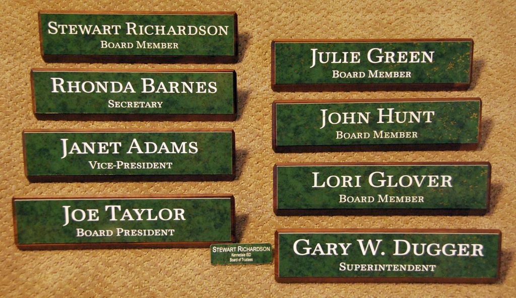 Desk name wedges and a name badge for a local Scho
