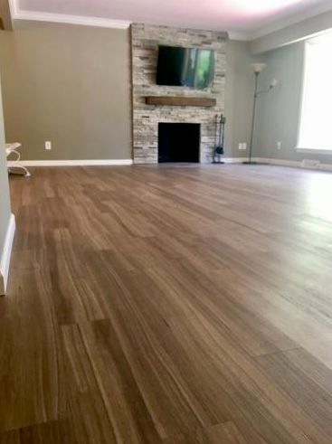 Luxury Vinyl Flooring and Ceramic Tile Fireplace R