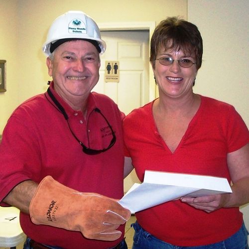 Russell recieving his OSHA 30 Certificate from our