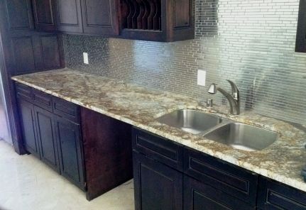 Leathered Granite with Stainless Steel Backsplash