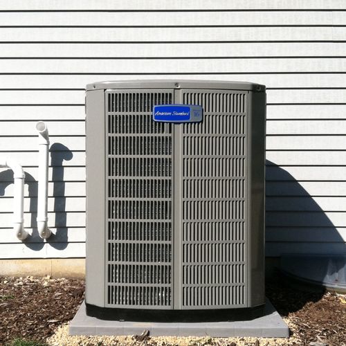 This is an American Standard air conditioner. It h