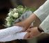 couple holding hands exchanging wedding vows