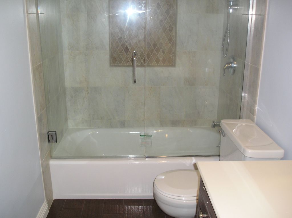I gave my restroom a new look with frameless doors