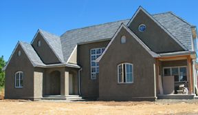 House at winery during construction in the Willame