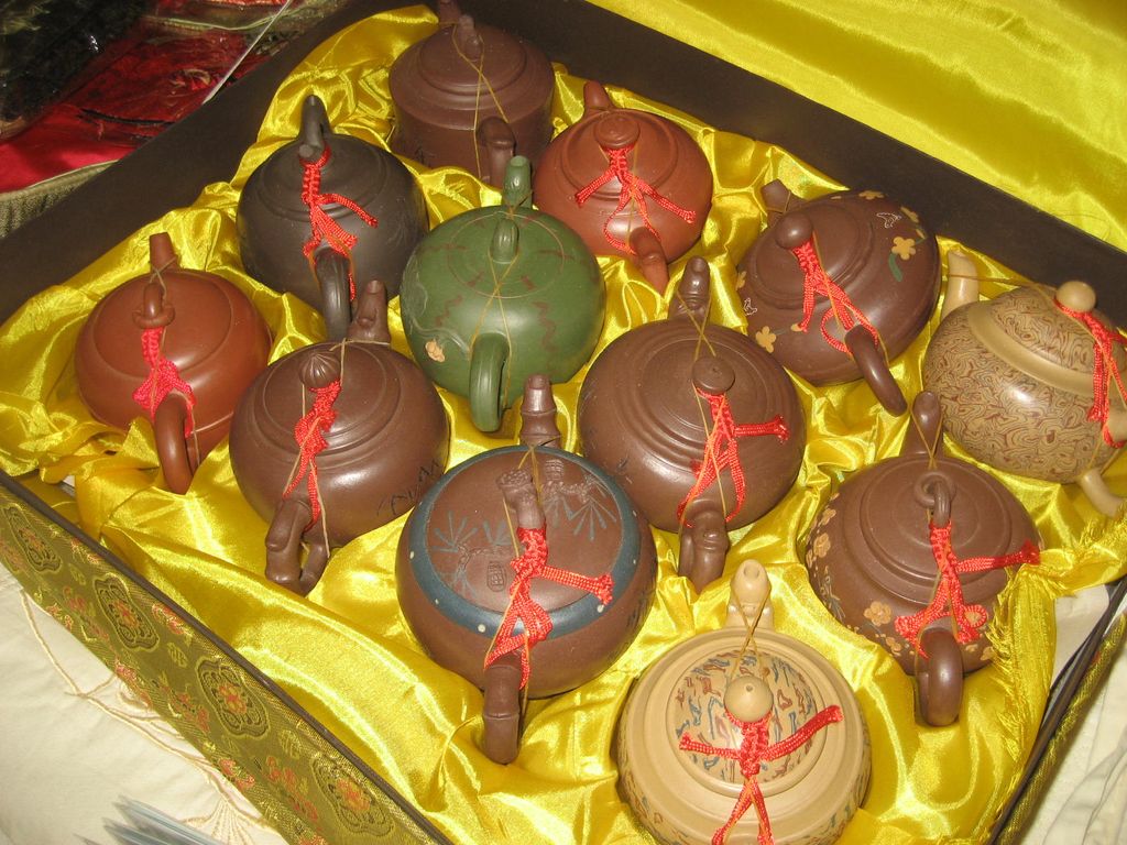 large collection of Chinese tea pots