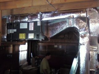 Goodman airhandler installed  hanging in garage wi