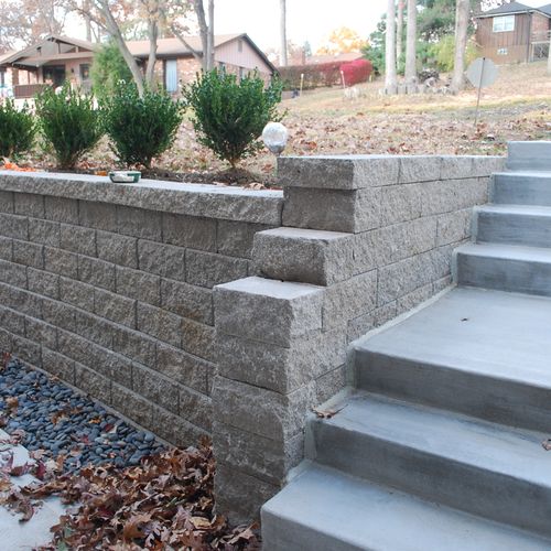 Replace an old tiewall with a new stone retaining 