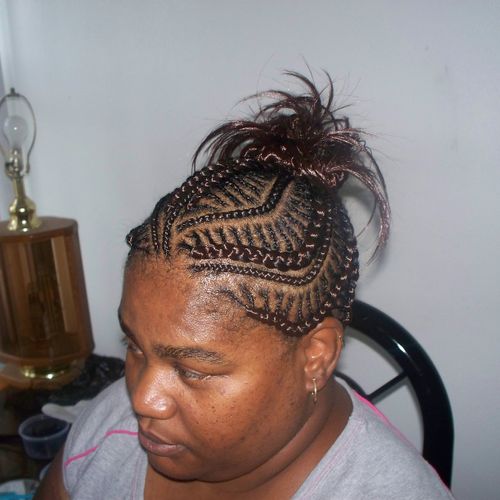 iverson braids in a ponytail with spikes
