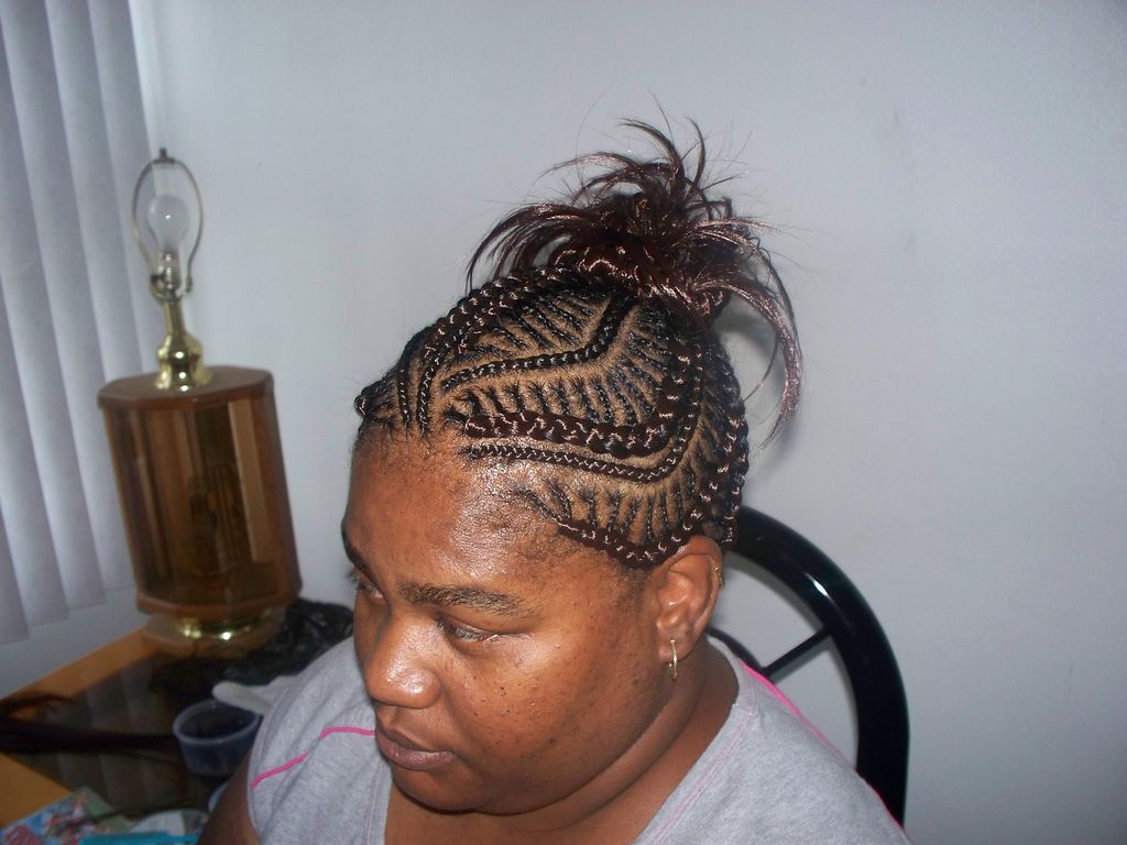 iverson braids in a ponytail with spikes