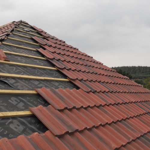 Tile roof no problem. We can do it all.