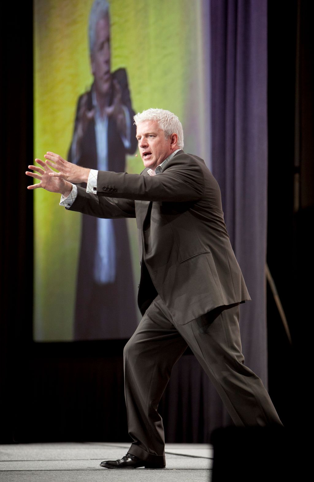 A motivational speech from a high energy presenter
