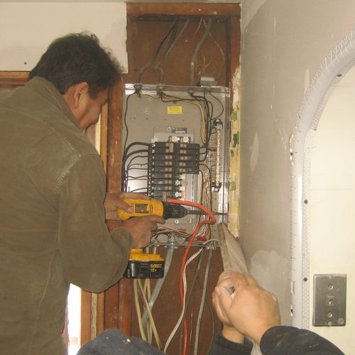 L&G Master Electrician working on Panel.