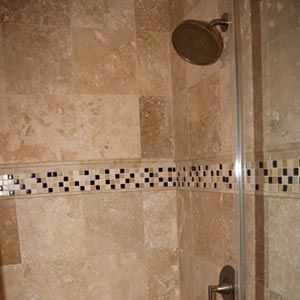 Travertine wall shower installation in Houston, TX