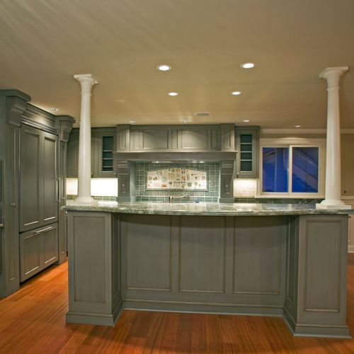 Custom kitchen with painted and stained cabinets, 