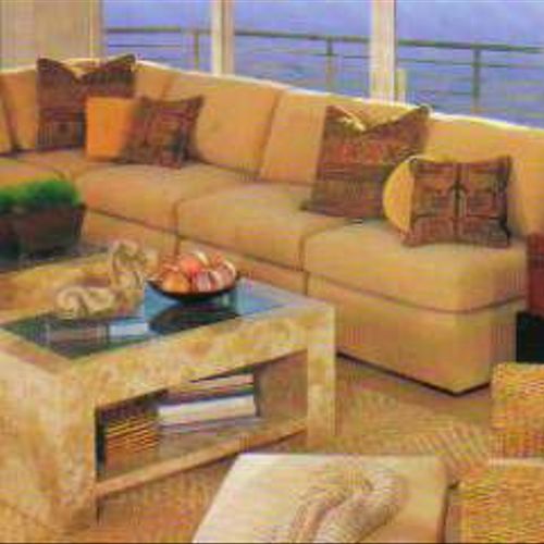Start by anchoring your living room  with a large,