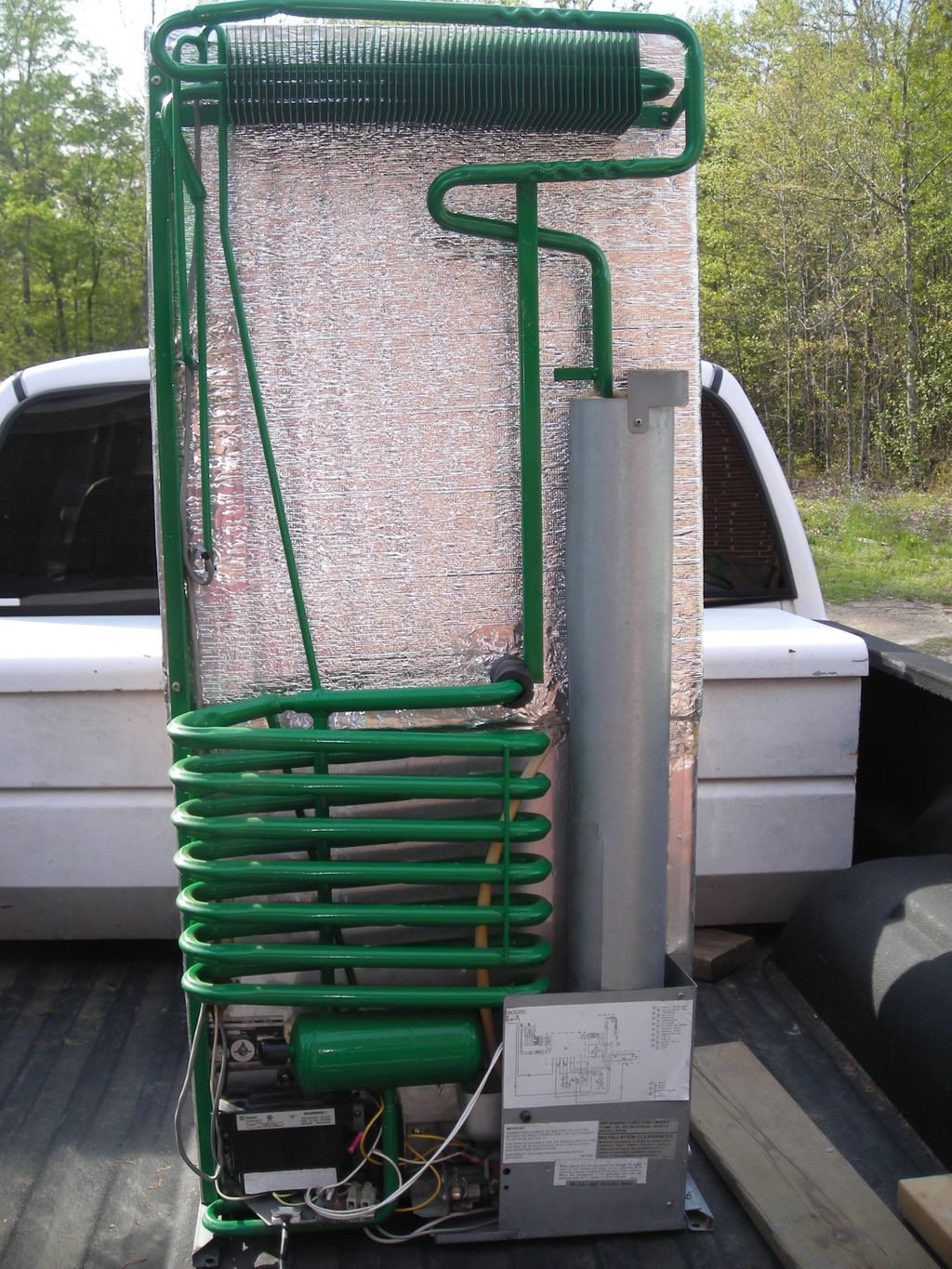 A recently reconditioned cooling unit (the green p