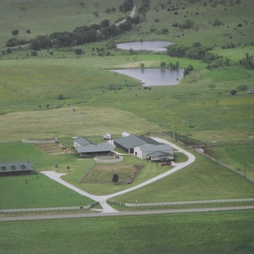 Aerial of facility located in quiet area between W