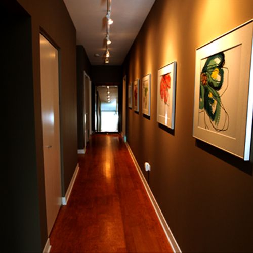 Hallway with contemporary framed prints from artis