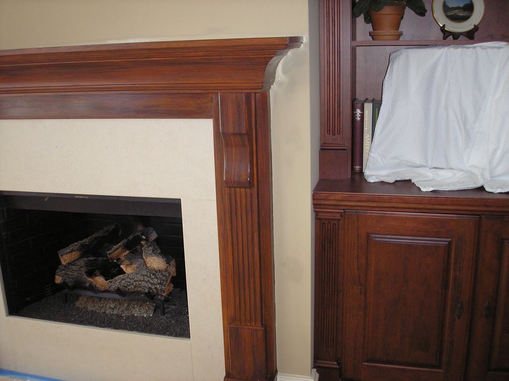 Faux cherry finish on fireplace to match bookcases