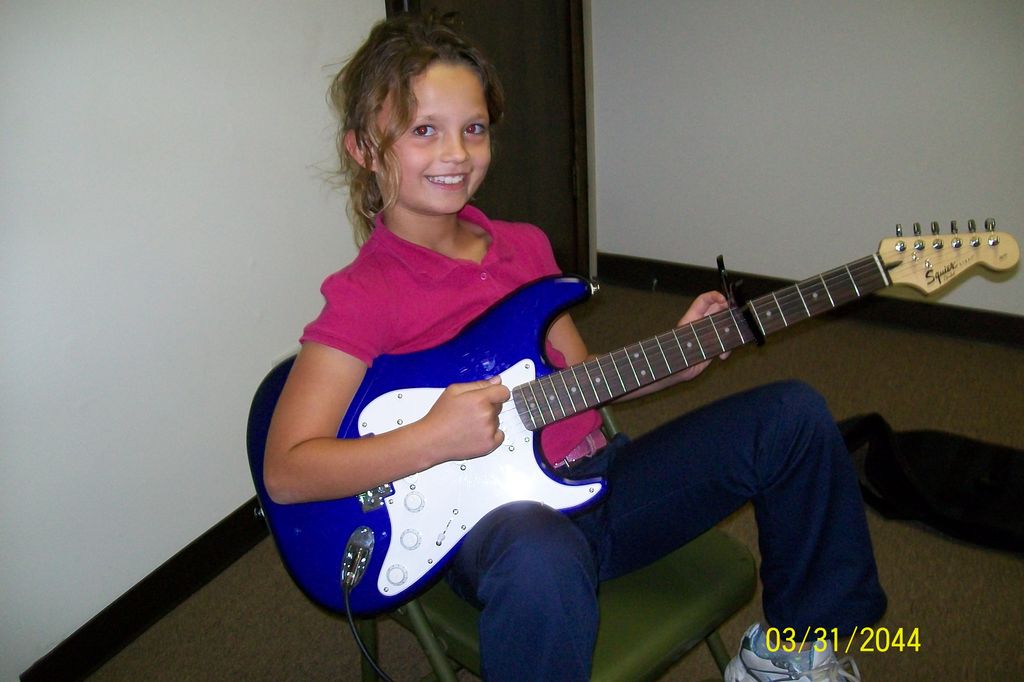 Love her blue guitar!