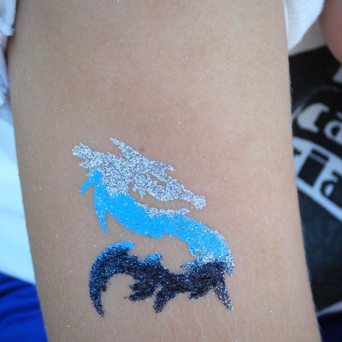 Glitter Tattoo by Caswell Designs Face Painting!