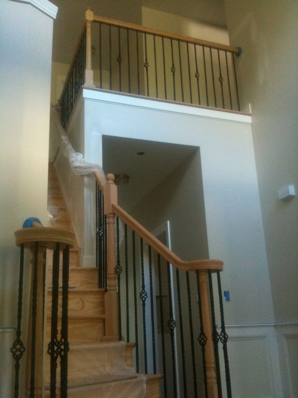 Oak hand rail and posts with cast iron balusters