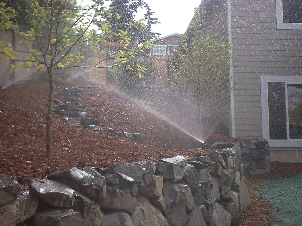 Sprinkler system on newly constructed hillside abo