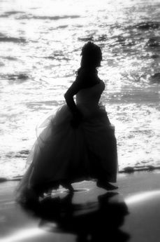 Royal Hawaiian Weddings - running on the beach cel