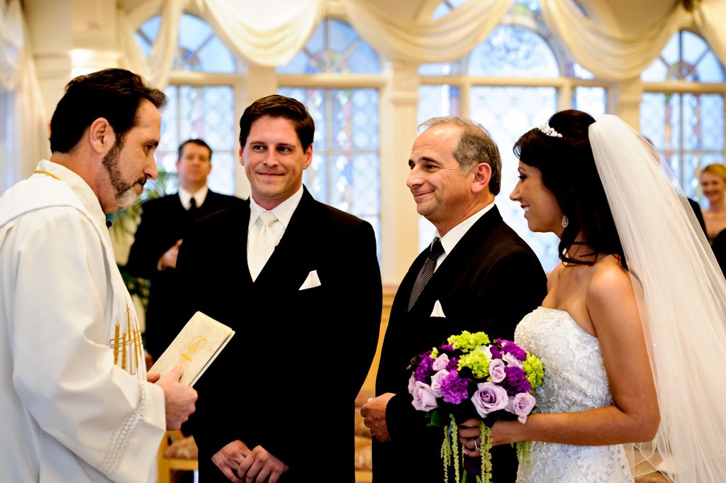 Ben looking on as Dossie arrives down the isle wit