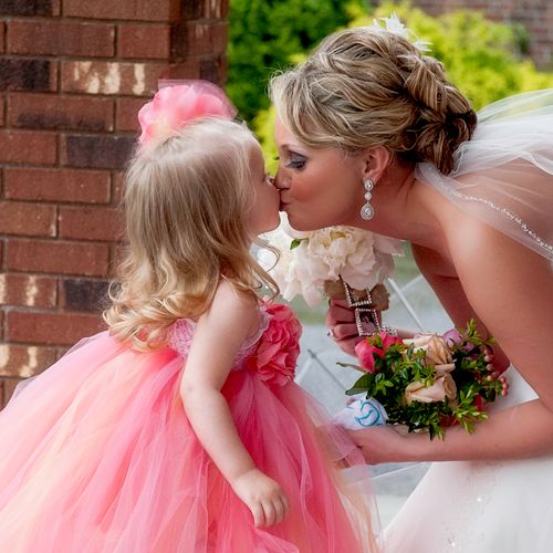 A kiss from the flower girl