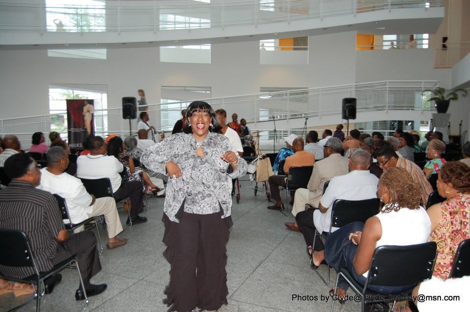 Angie performing in the atrium of the Woodruff Art