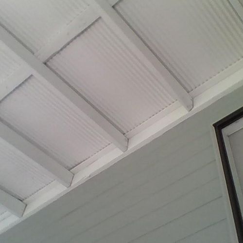 Tin roof over front porch/oil primer w 2 coats lat