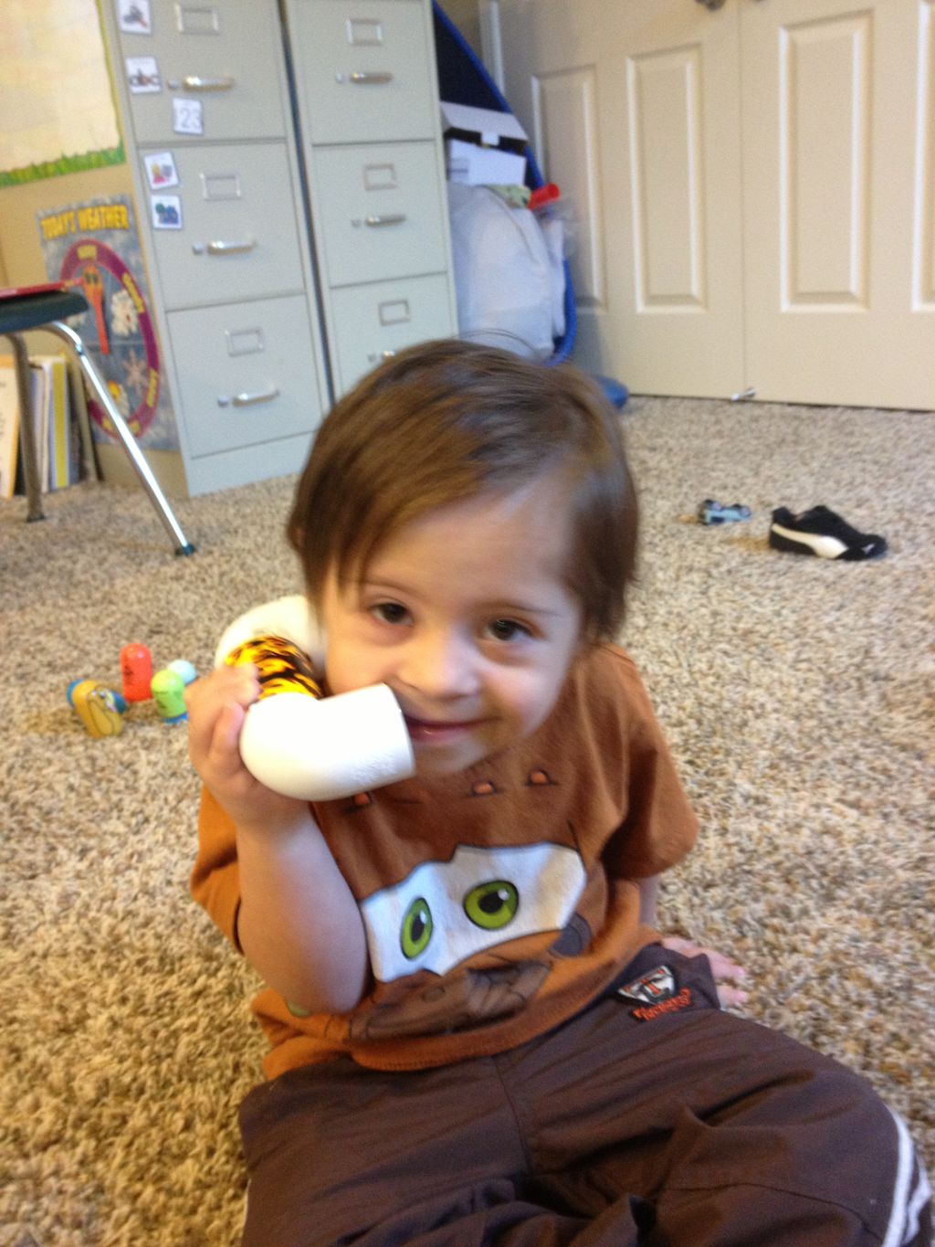 Speech therapy with a little pvc phone.