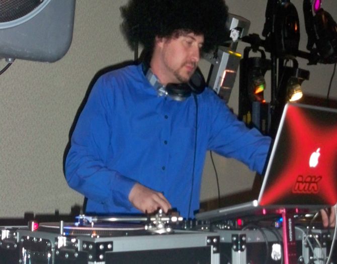 Getting funky at corporate 70s theme Christmas par