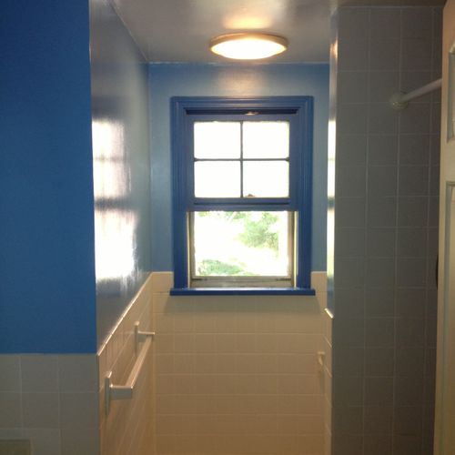 A bathroom, we removed wallpaper and painted a bri