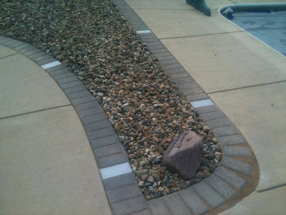 U-bend between one side walk leading to the pool a