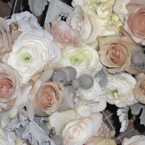 Bridesmaid bouquet of Sahara roses, white ranuncul