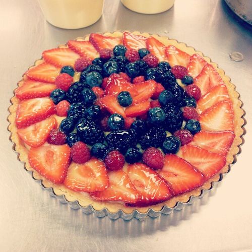 A classic French Fruit Tart with a vanilla bean pa