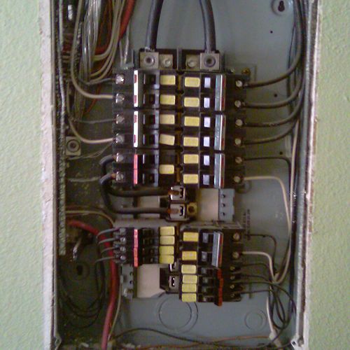 Electrical service panel with breakers.