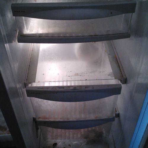 Before of refrigerator in a move out clean