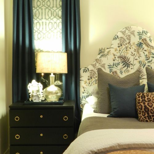 Master Bedroom with custom headboard, pillows and 