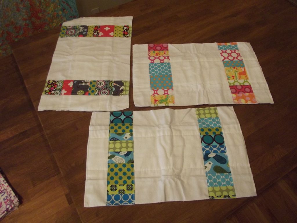 Custom patchwork burp cloths.