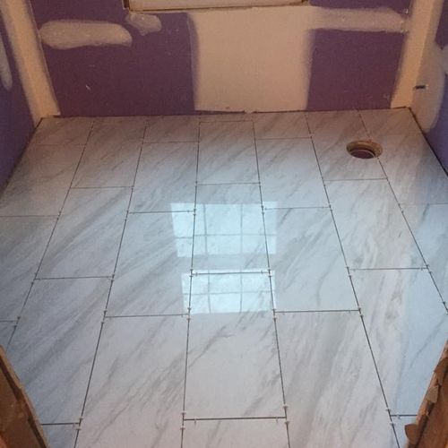 Tile over heated mat
