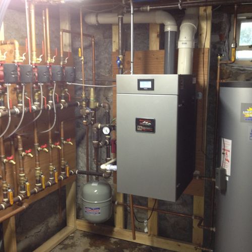 Oil to gas boiler conversion with an indirect wate