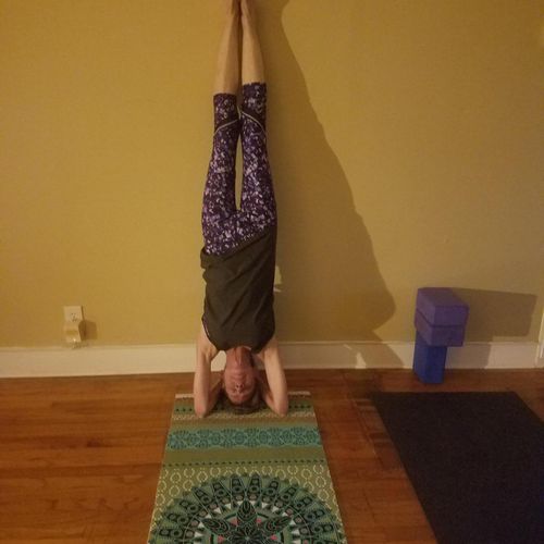 Client building strength, learning headstand