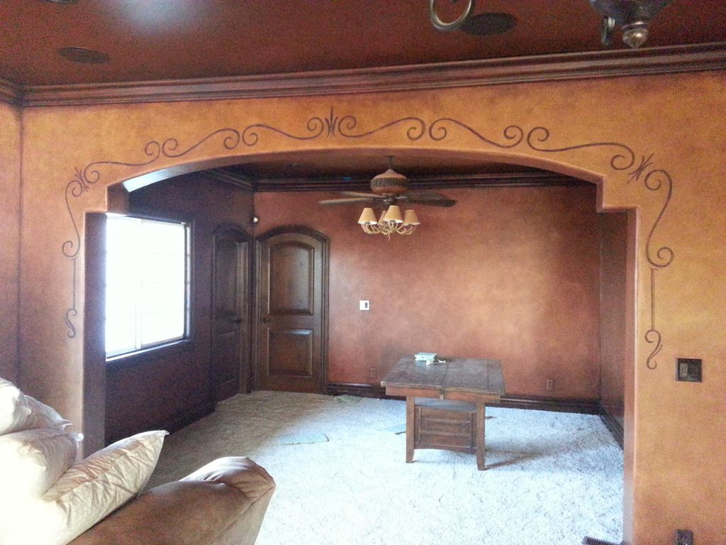 Walls textured,  glazed with browns & gold, hand p