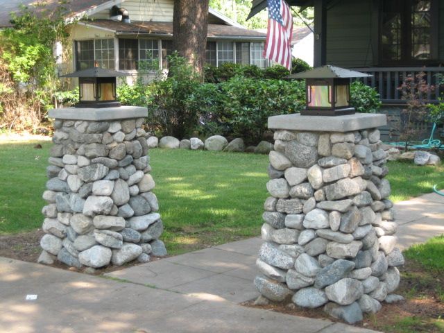 Craftsman-style entry columns with river rock fini