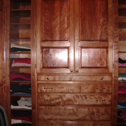 Custom closet with raised panel doors